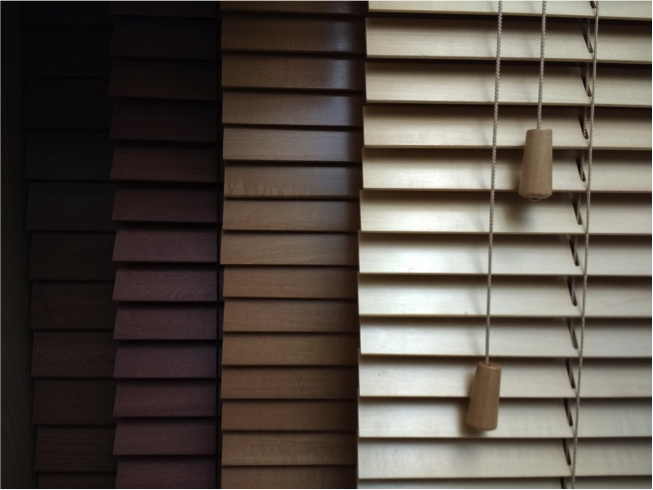 Varying colored wood blinds
